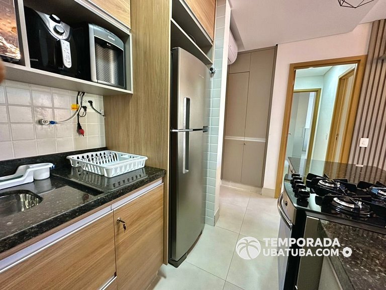 BAM310 – Apartamento frente mar com 2 dormitórios. Condomíni
