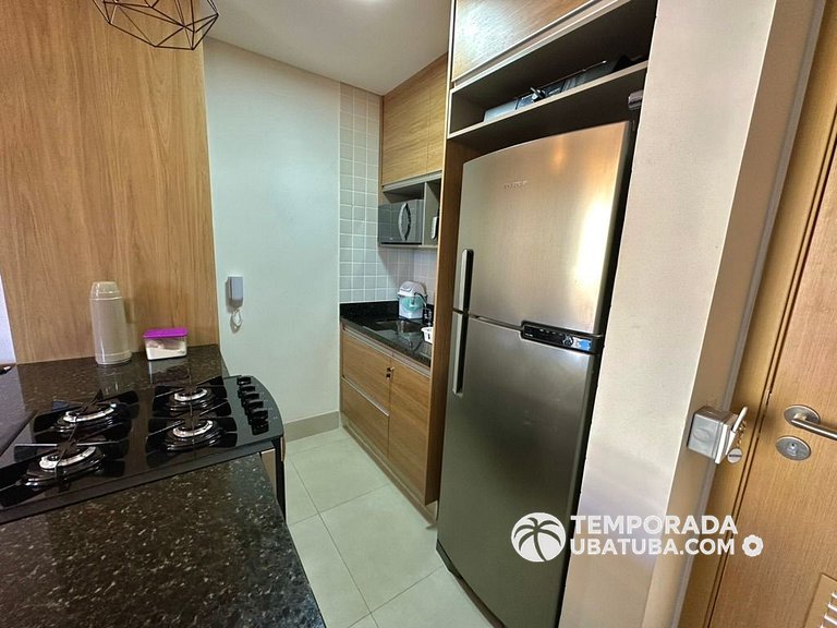 BAM310 – Apartamento frente mar com 2 dormitórios. Condomíni