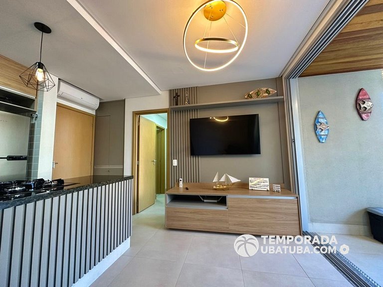 BAM310 – Apartamento frente mar com 2 dormitórios. Condomíni