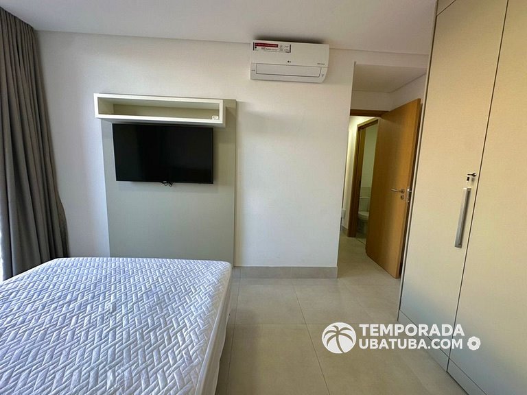 BAM310 – Apartamento frente mar com 2 dormitórios. Condomíni