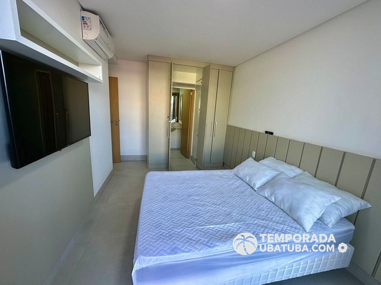BAM310 – Apartamento frente mar com 2 dormitórios. Condomíni